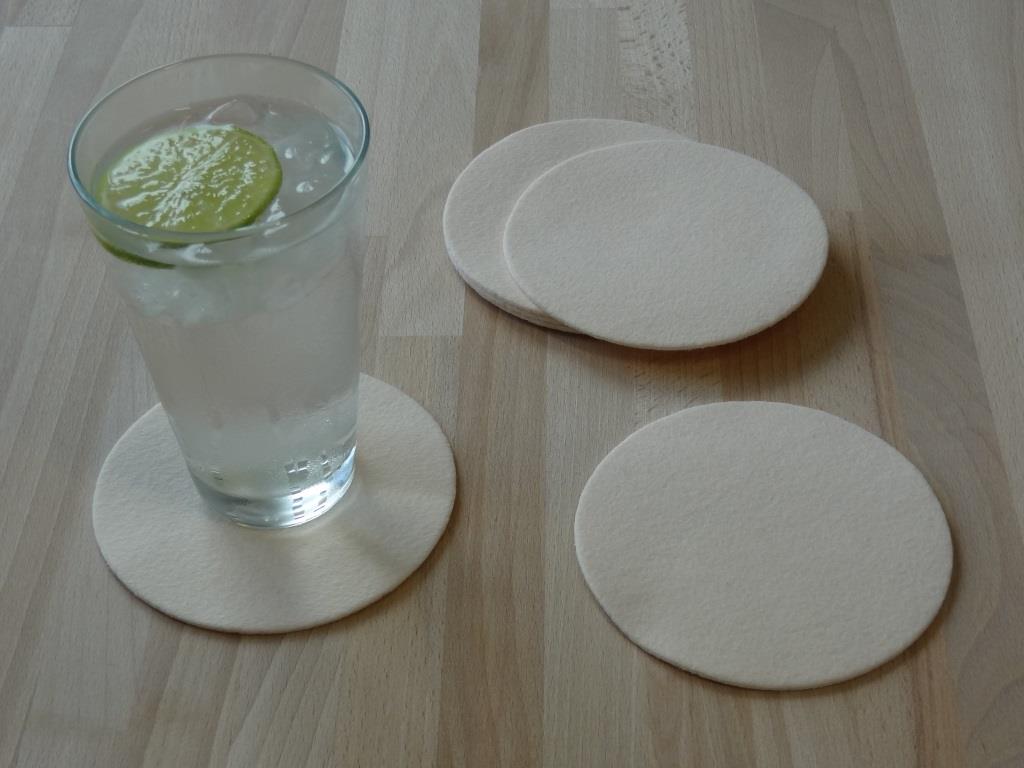 Placemats round in a set of 8 with matching round glass coasters, powder